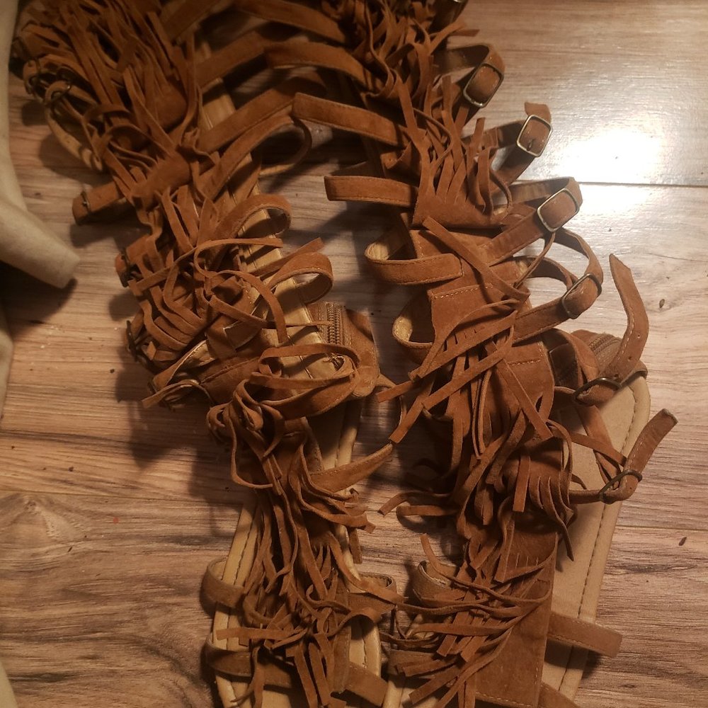 Knee high moccasin fringe sandals